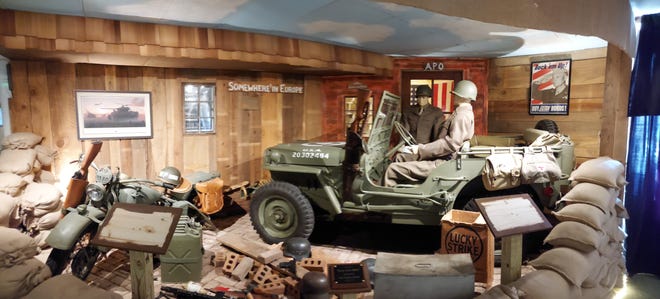 One of the main exhibits at the Veterans History Museum of the Carolinas is "Letters from Home," in which a 1943 Willys Jeep and 1942 Harley-Davidson motorcycle depict MPs pulling up to an Army Post Office in hopes of receiving letters from home.