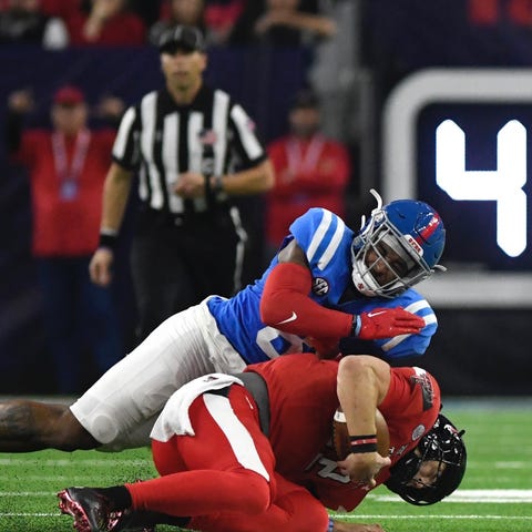 Ole Miss linebacker Troy Brown tackles Texas Tech 