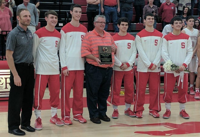 The late Chuck Ridenour was honored with the Charles C.W. Williams Sixth Man Award in 2017 by the Shelby boys basketball team.