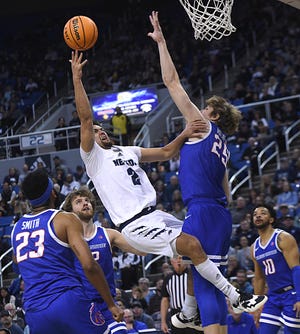 Nevada's Jarod Lucas shoots while taking on Boise State during their basketball game at Lawlor Events Center in Reno on Dec. 28, 20