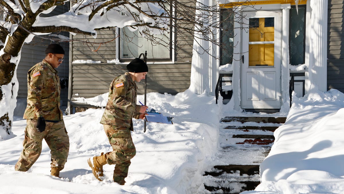 National guard members check on residents, Wednesday, Dec. 28, 2022, in Buffalo N.Y., following a winter storm.