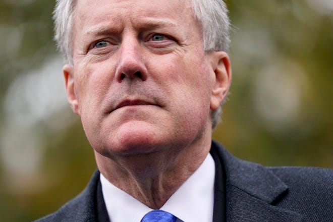 FILE - White House chief of staff Mark Meadows speaks with reporters outside the White House, Oct. 26, 2020, in Washington.