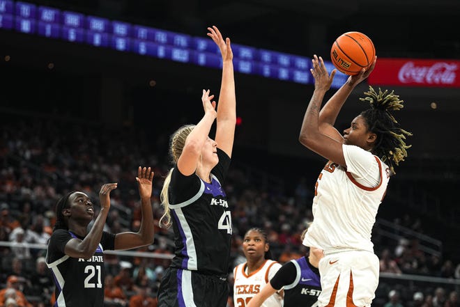 Texas Longhorns guard DeYona Gaston (5) shoots the ball over Kansas State center Taylor Lauterback (41) during the game at the Moody Center Saturday, Dec. 31, 2022 in Austin.
