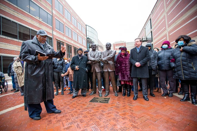 Pastor Odell Hughes addresses the crowd after joining the traditional Martin Luther King holiday march from the County-City Building to the statue of the Rev. Theodore M. Hesburgh and the Rev. Martin Luther King Jr. on Feb. 17, 2022, in South Bend. Last year's events were delayed a month because of COVID-19 concerns.