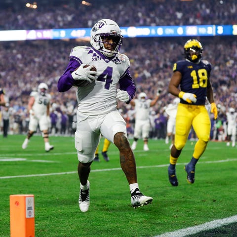 TCU wide receiver Taye Barber (4) runs for a touch