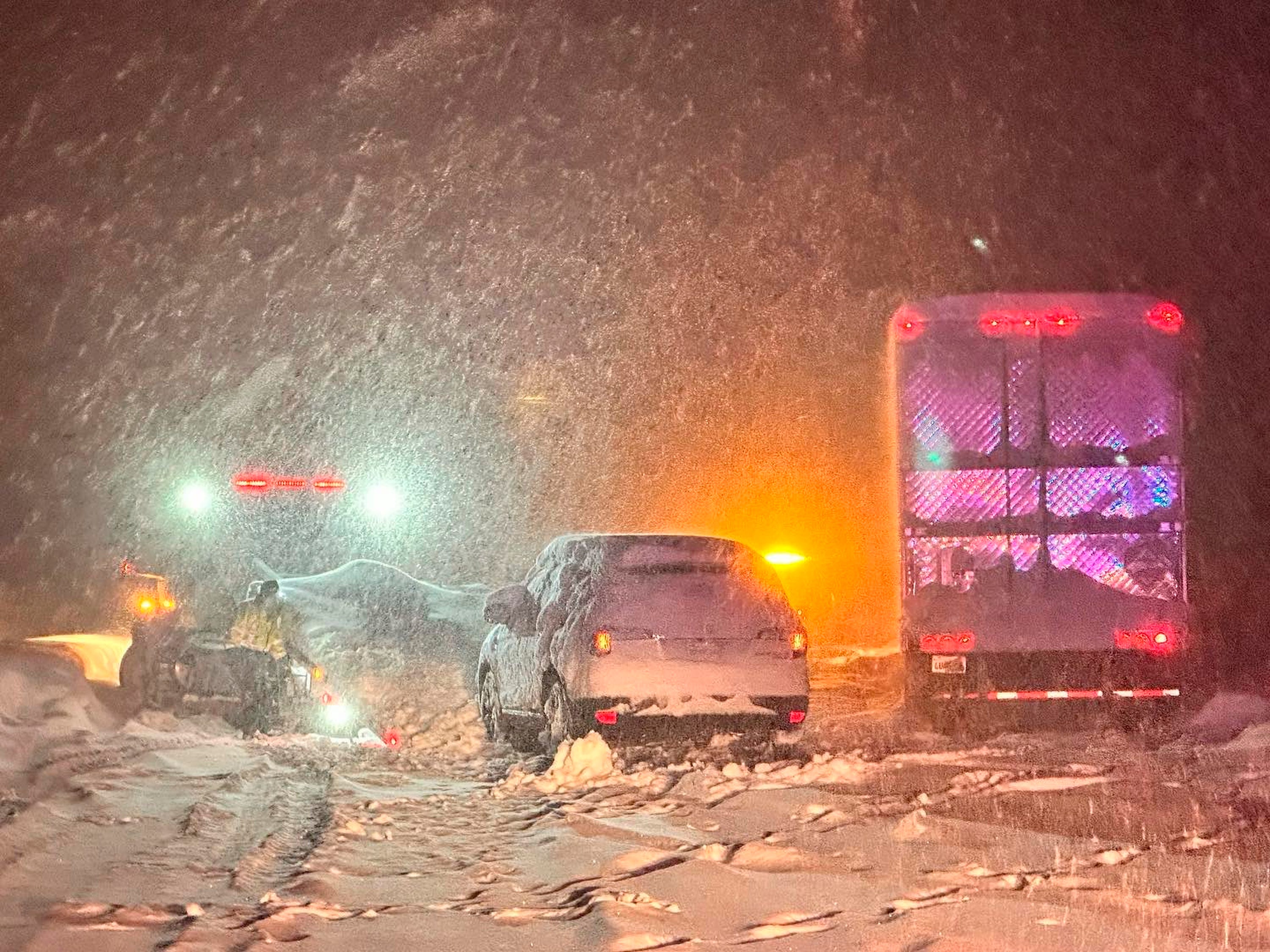 This image taken Saturday, Dec 31, 2022 and released by California Highway Patrol Truckee, vehicles stranded are stranded along Interstate 80 at the Nevada State line and Colfax, Calif. Driving conditions are dangerous and treacherous, travel is not advised. There are dozens and dozens of vehicles stuck on the freeway and county roads, and we are responding to calls as Calif. California was drying out and digging out on New Year's Day after a powerful storm brought drenching rain or heavy snowfall to much of the state, snarling traffic and closing highways. (California Highway Patrol Truckee via AP) ORG XMIT: LA704