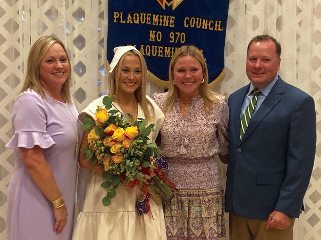 Anna Catherine Bradford, daughter of Jerry and Amy Bradford of Plaquemine, was named the 2022 Evangeline during a social at the Knights of Columbus Council 970 Home in Plaquemine. She followed the footsteps of her sister Lily Bradford (pictured between her and her father) who was crowned Evangeline in 2019.