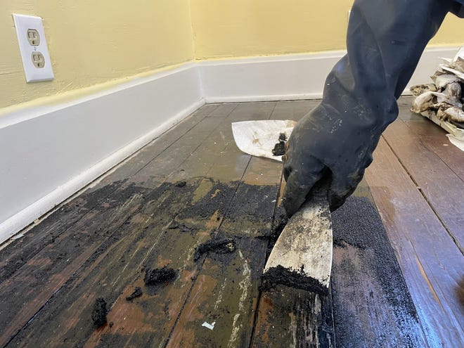 For the first time in 20 years, Alan Miller was on his knees stripping blackened varnish from the dining room floor of his daughter's house.