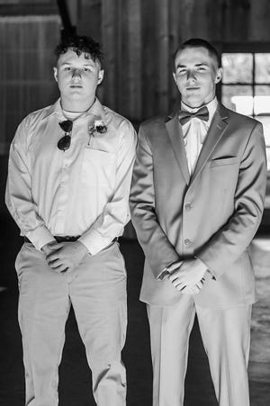 Brothers Harley Lasseter and Dawson Lasseter posed for a photo in February 2022, at Dawson's wedding to Hailey Mayo Lasseter. Dawson was killed in crash on New Year's Day — about nine months after Harley died in a hit-and-run crash.