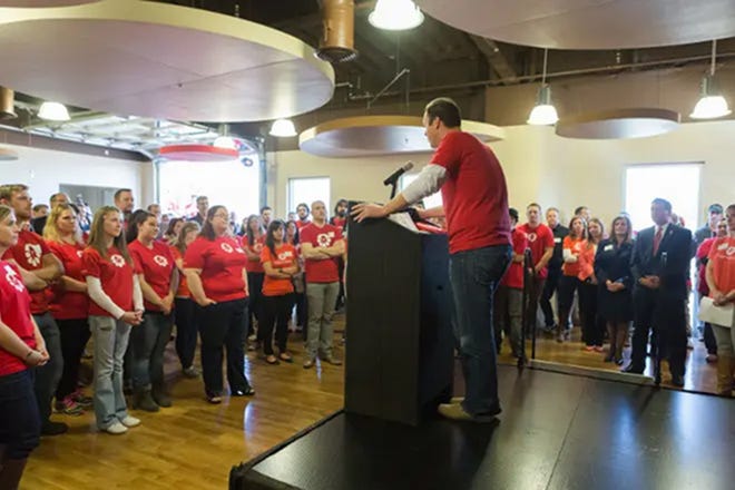 Custom Ink President Marc Katz talks to 250 employees during the opening of the company's second facility in Reno in 2014.