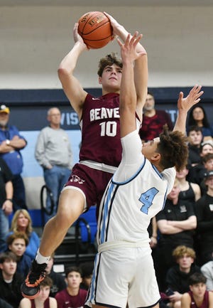 Beaver's Aiden Townsend shoots over Central Valley's Antwon Johnson during the Tuesday, Jan. 3 game at Central Valley.  The Bobcats won the game, 59-52.