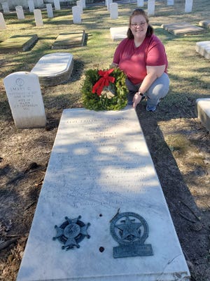 Brittney Kean placed a wreath on General Philemon Thomas’ grave at the Baton Rouge National Cemetery.