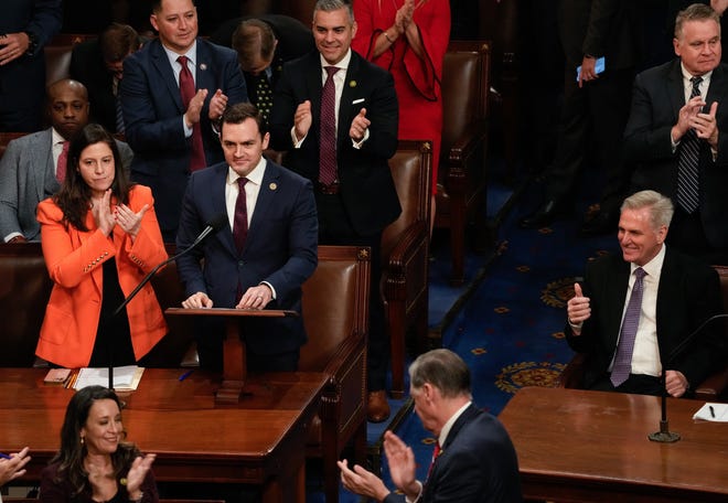 Kevin McCarthy (right) reacts after Rep. Mike Gallagher, R-Wis., nominates McCarthy for speaker of the House on Wednesday, Jan. 4, 2023.