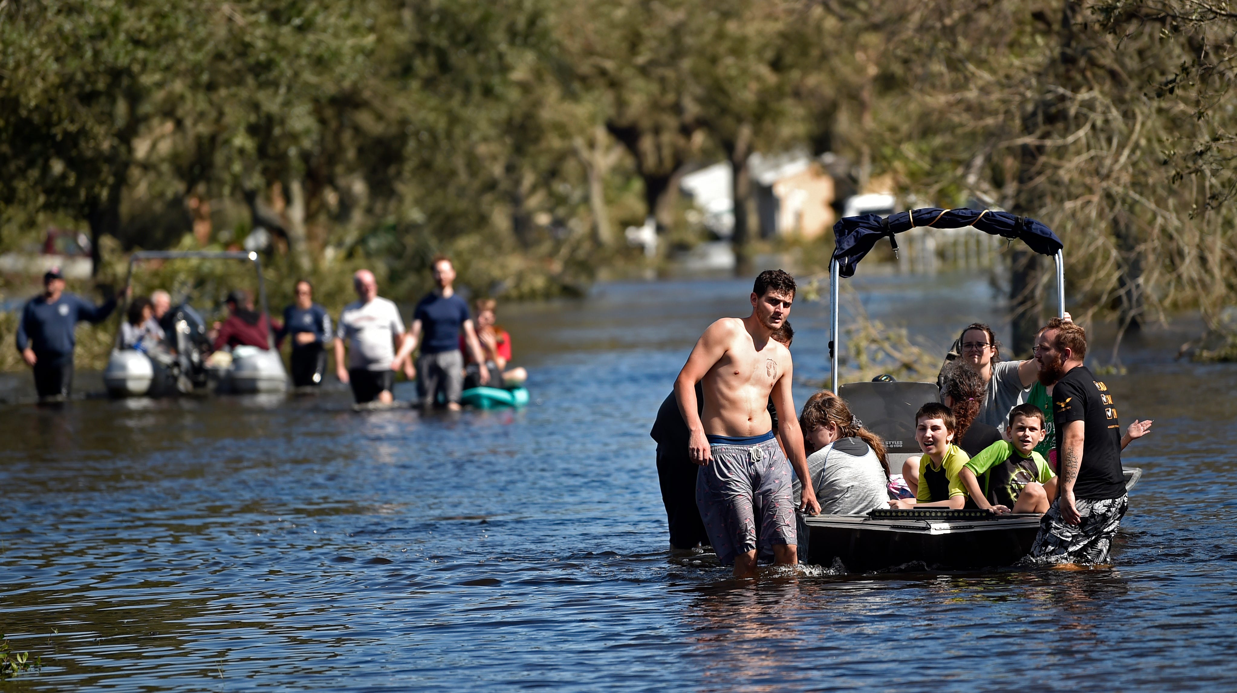 North Port residents used kayaks, paddle boards and other small watercraft to traverse flooded roads that surrounded their homes in North Port during Hurricane Ian.