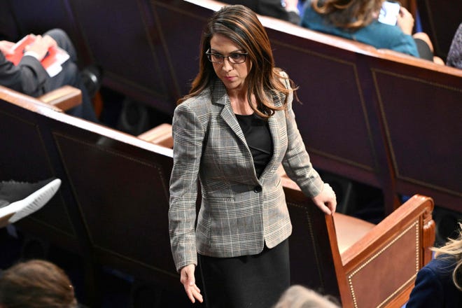 US Representative Lauren Boebert (R-CO) walks on the House floor as voting continues for new speaker at the US Capitol in Washington, DC, January 5, 2023.