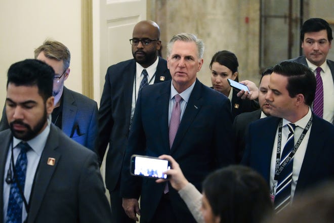 House Republican Leader Kevin McCarthy, R-Calif., arrives Friday as the House meets for the fourth day to try to elect a speaker. After making more concessions, he finally began winning support from several of the GOP conservatives who have been blocking him.