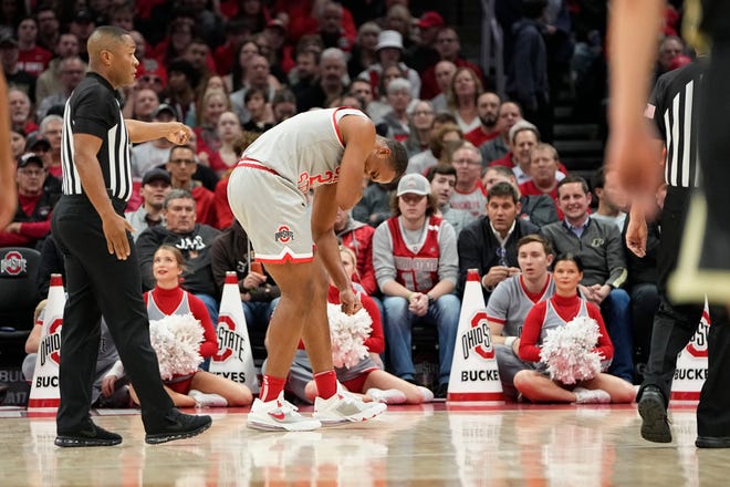 Jan 5, 2023; Columbus, OH, USA;  Ohio State Buckeyes forward Zed Key (23) leaves the game with an injury during the first half of the NCAA men's basketball game against the Purdue Boilermakers at Value City Arena. Mandatory Credit: Adam Cairns-The Columbus Dispatch