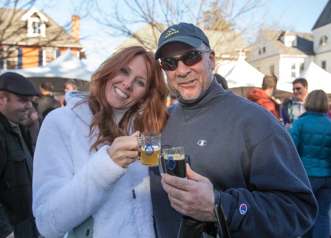 The Kennett Winterfest returns for a good time to Kennett Square, Pennsylvania on Saturday, Feb. 25, 2023. Lisa Murray of Kennett Square and Joe Morinelli of Honeybrook, Pennsylvania hang out at Winterfest.