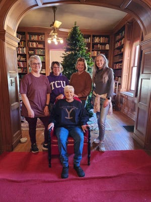 Taking down Christmas Decorations can be a fun event. Senior-Junior Forum members dedicated to helping The Kell House take down holiday decorations. Members left to right: Sonja Oliver, Theresa Gilmore, Connie Joyce, Vicky Tigert and Christy Whiteley.
