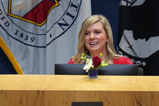 Austin City Council member Paige Ellis speaks at Friday's City Hall ceremony.  The new council elected Ellis as interim mayor.