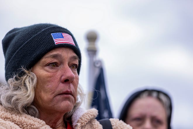 Micki Witthoeft, mother of Ashli Babbitt, who was killed on Jan 6, 2021 in the riot on the U.S. Capitol, stands earlier this month with supporters of those arrested that day in Washington, D.C.
