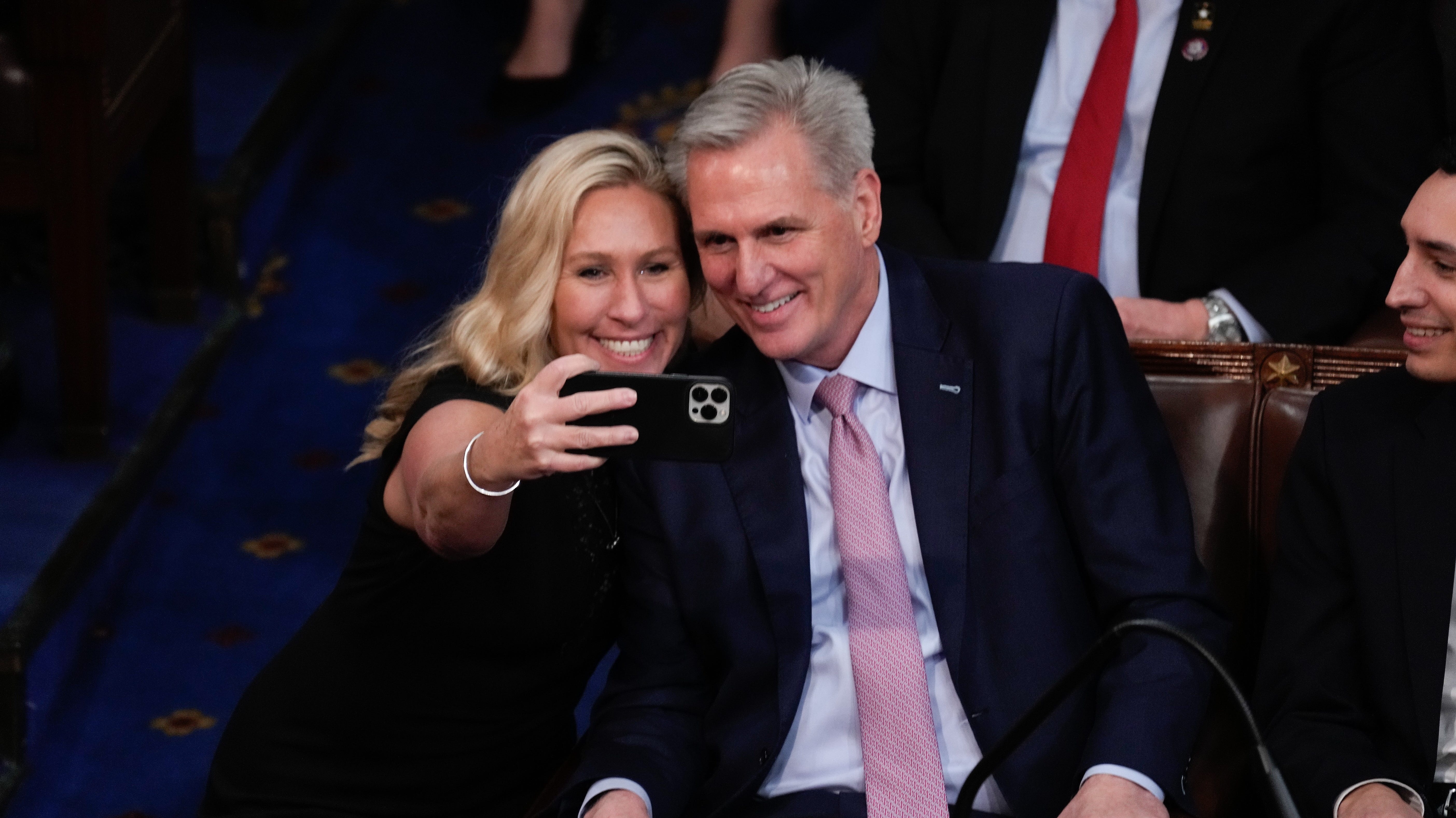 Rep. Marjorie Taylor Greene, R-Ga., takes a selfie with the newly elected House Speaker Kevin McCarthy on Jan. 6, 2023.
