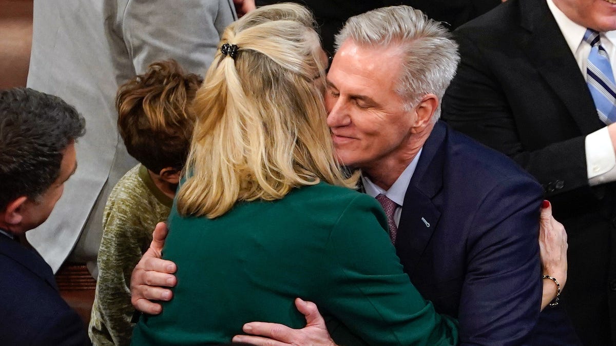 Kevin McCarthy, R-Calif., gets a hug after entering the House of Representatives after being elected speaker on Jan. 7, 2022.