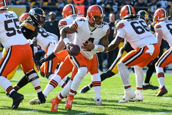 Cleveland Browns quarterback Deshaun Watson (4) takes a snap during the first half of an NFL football game against the Pittsburgh Steelers in Pittsburgh, Sunday, Jan. 8, 2023. (AP Photo/Don Wright)