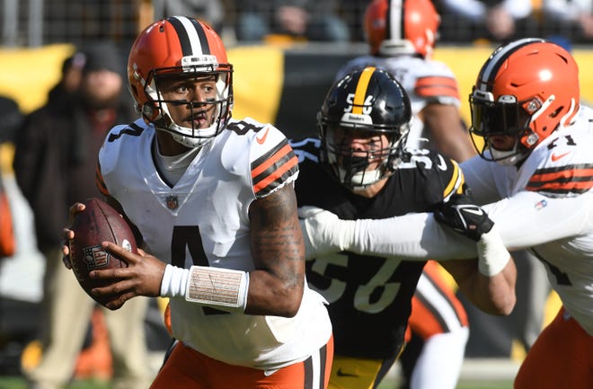 Jan 8, 2023; Pittsburgh, Pennsylvania, USA;  Cleveland Browns quarterback Deshaun Watson (4) is chased by Pittsburgh Steelers linebacker Alex Highsmith (56) during the first quarter at Acrisure Stadium. Mandatory Credit: Philip G. Pavely-USA TODAY Sports