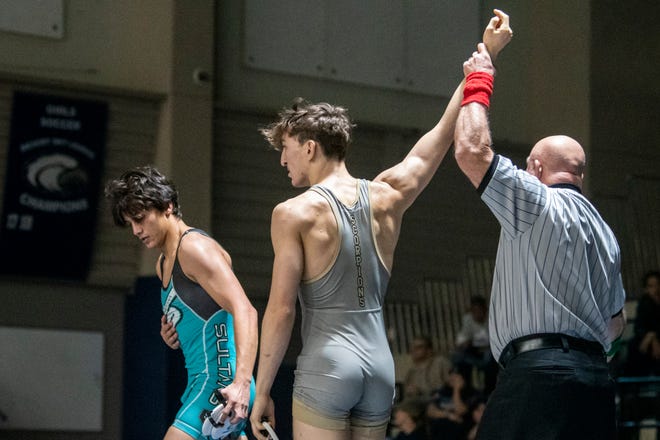 Hesperia's Evan Roy has his hand raised after beating Sultana's Thomas Jablonski in the 132-pound championship match at the 15th annual Adrian Amaral Scholarship Invitational on Saturday, Jan. 7, 2023.