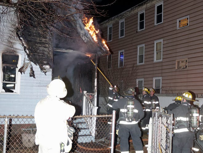Firefighters rescued a woman Sunday from her single-family home on Litchfield Street in Worcester.