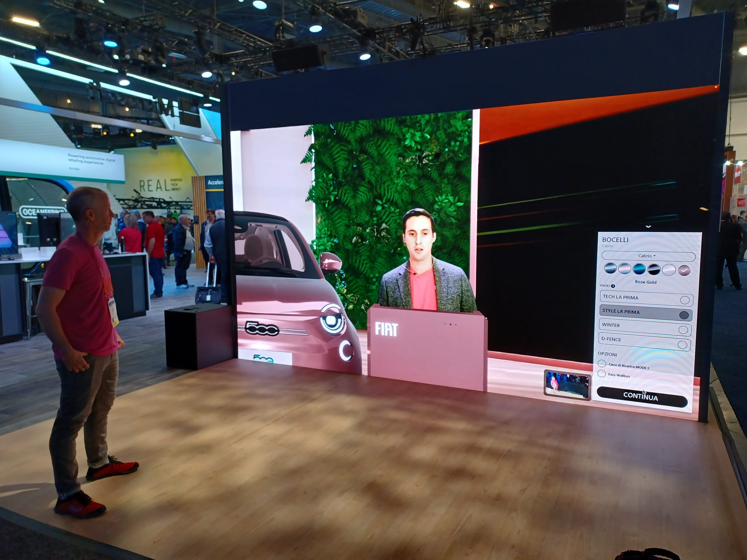 Ziv Navoth, chief marketing officer at Touchcast Inc., demonstrates at the CES consumer electronics trade show in Las Vegas the company's virtual Fiat 500e showroom that uses Microsoft Teams to connect with a remote salesperson, in this case, Tim Ferrone, Touchcast's sales director.