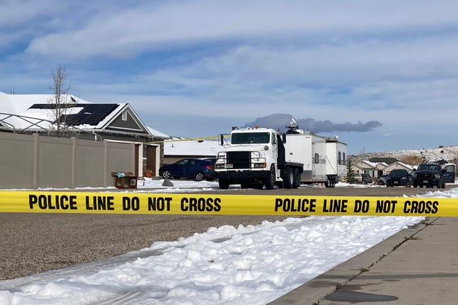 Police continue their investigation at a home where eight family members were found dead in Enoch, Utah, Thursday, Jan. 5, 2023. Officials said Michael Haight, 42, took his own life after killing his wife, mother-in-law and the couple's five children.