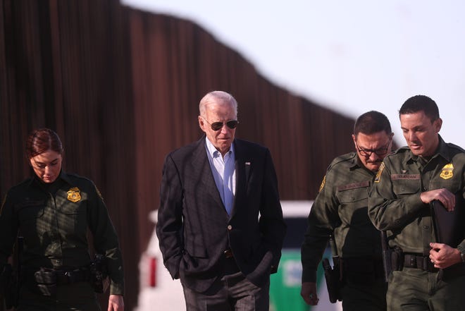 President Joe Biden walks along the border wall with Customs and Border Protection agents during his visit to El Paso, Texas on Jan. 8, 2022. The president visited the border city prior to heading the to North American Summit in Mexico City. 