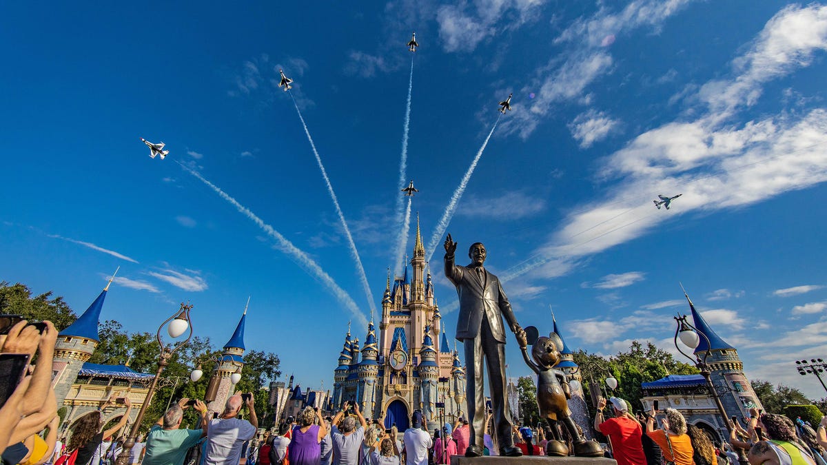U.S. Air Force Thunderbirds fly over Cinderella Castle at Walt Disney World's Magic Kingdom on Oct. 27, 2022, ahead of National Veterans and Military Families Month in November.