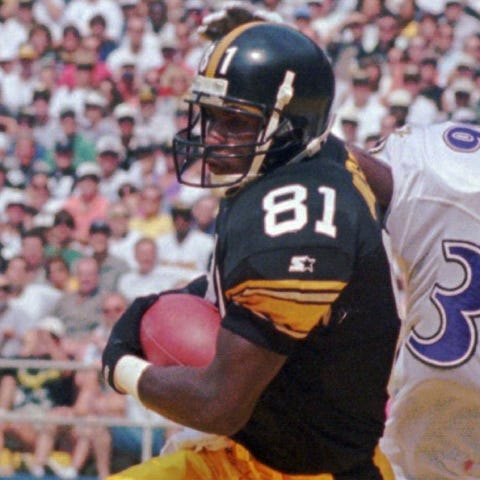Charles Johnson (81), who played for the Pittsburg