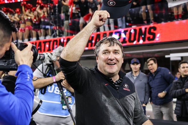 Georgia coach Kirby Smart celebrates with fans after the NCAA College Football National Championship game between TCU and Georgia on Monday, Jan. 9, 2023, in Inglewood, Calif. Georgia won 65 - 7 against TCU. 