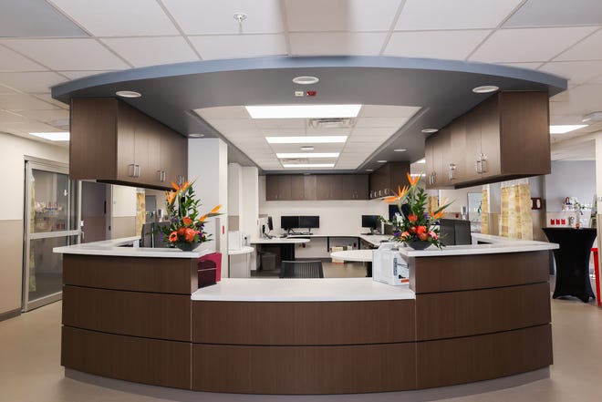 The central desk of HCA Florida Fawcett Hospital’s 4 East ICU. The hospital reopened its third and fourth floors Jan. 9 and was fully functional for the first time since it was closed Sept. 29 because of Hurricane Ian.
