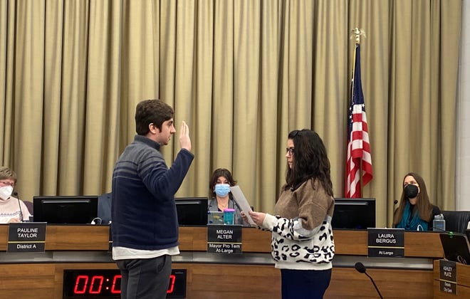 Iowa City City Clerk Kellie Fruehling swear in  Andrew Dunn as the newest City Council member Tuesday.  Dunn was appointed to the seat after Janice Weiner resigned to serve in the Iowa Senate.