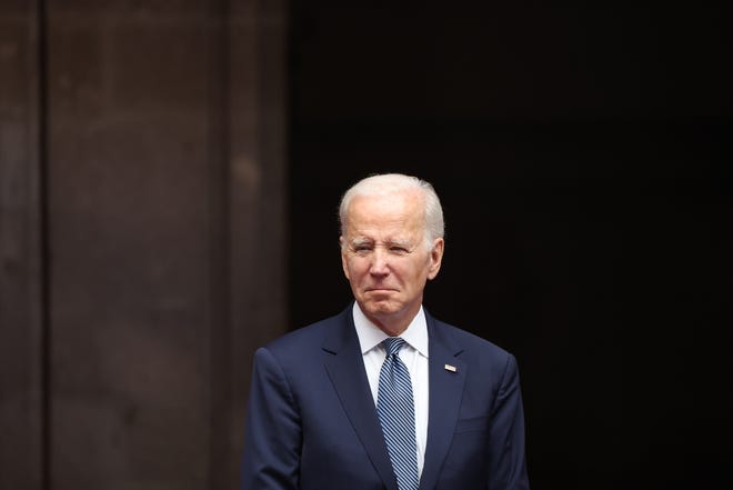 President Joe Biden looks on during a welcome ceremony as part of the 2023 North American Leaders Summit at Palacio Nacional on Monday in Mexico City, Mexico.