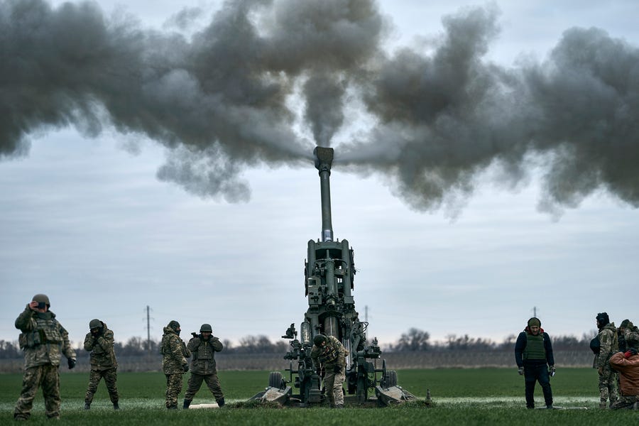 Ukrainian soldiers fire at Russian positions from a U.S.-supplied M777 howitzer in the Kherson region, Ukraine, Jan. 9, 2023.