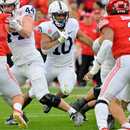 Penn State running back Nick Singleton (10) carries the ball against Utah during the first half at the 2023 Rose Bowl.