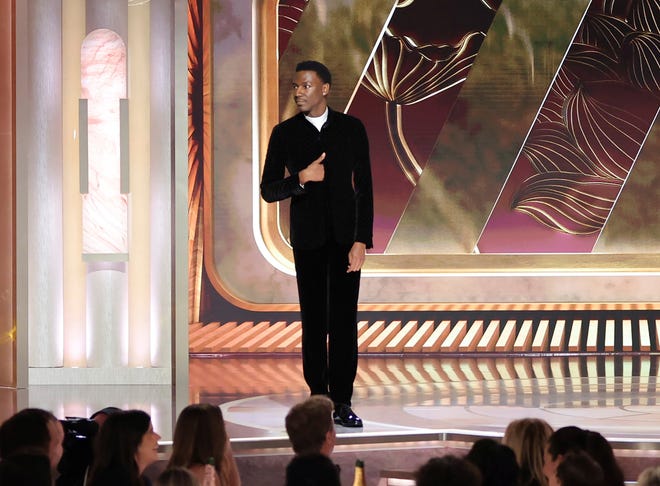 Gambar yang dirilis oleh NBC ini menunjukkan pembawa acara Jerrod Carmichael selama monolognya di Penghargaan Golden Globe Tahunan ke-80 yang diadakan di Beverly Hilton Hotel pada Selasa, 10 Januari 2023, di Beverly Hills, California.