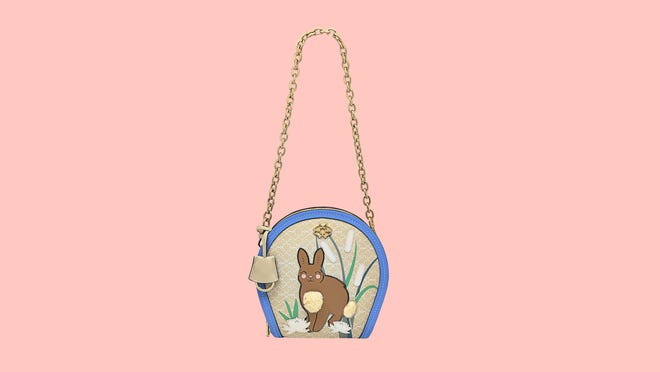 Playful Radley's Small Zip-Top Shoulder Bag is small enough for an evening out, but big enough to hold your essentials.