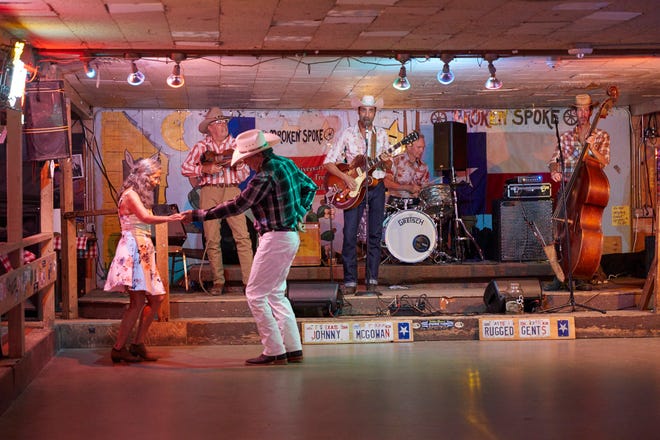 Johnny McGowan and the band entertain dancers at Broken Spoke on May 30, 2020.