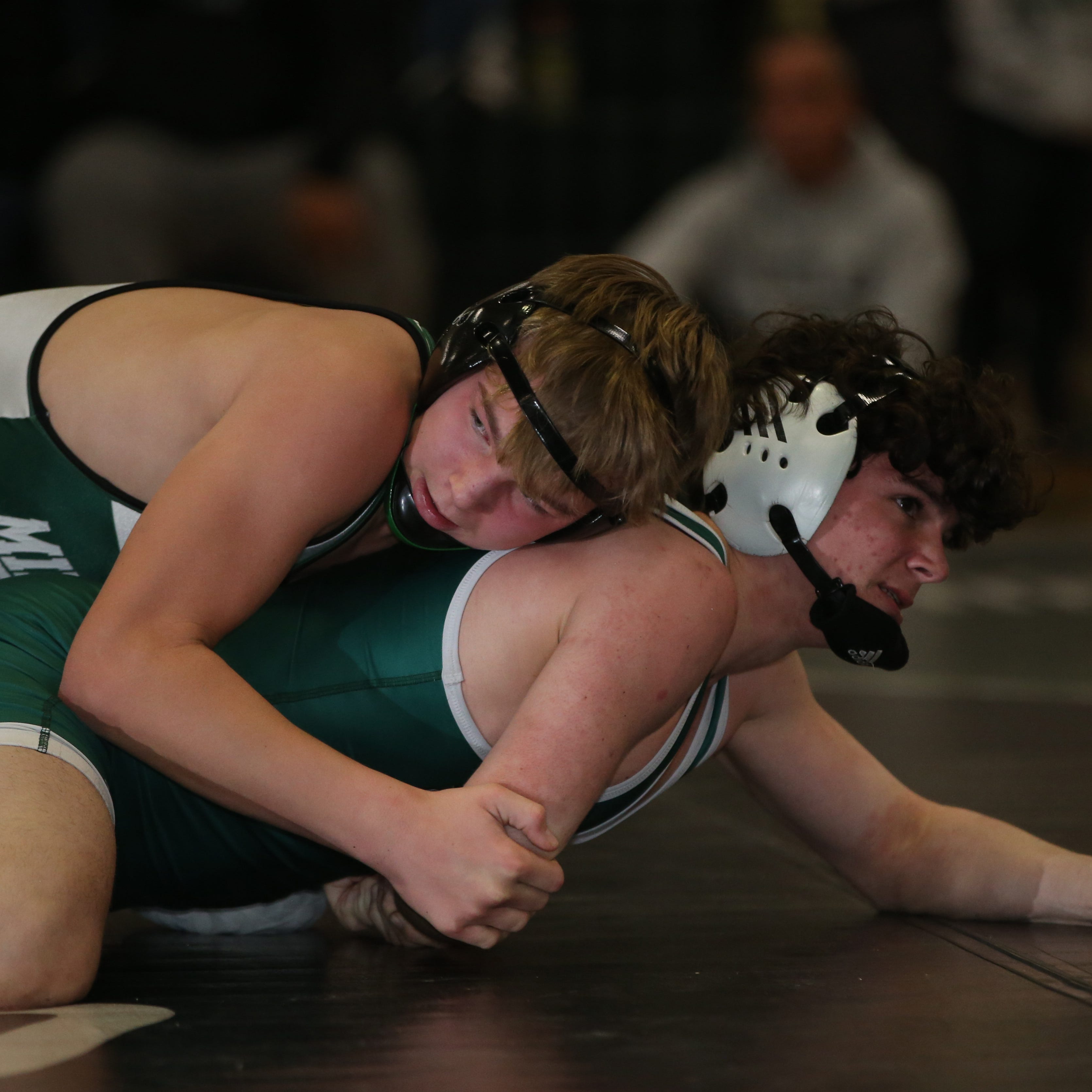 From top, Minisink Valley's Zach Filip and Cornwall's Patrick Cosgrove wrestle in the 152 lb match during the Section 9 Duals final at Minisink Valley High School on January 11, 2023.
