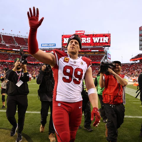 J.J. Watt of the Arizona Cardinals walks off the f