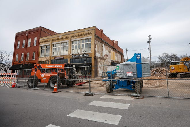 Fences and construction equipment surround the former building located at 101 W. Church St. in downtown Ozark on Wednesday, Jan. 11, 2023. On Wednesday, demolition of the building, which collapsed on Dec. 29, was complete.