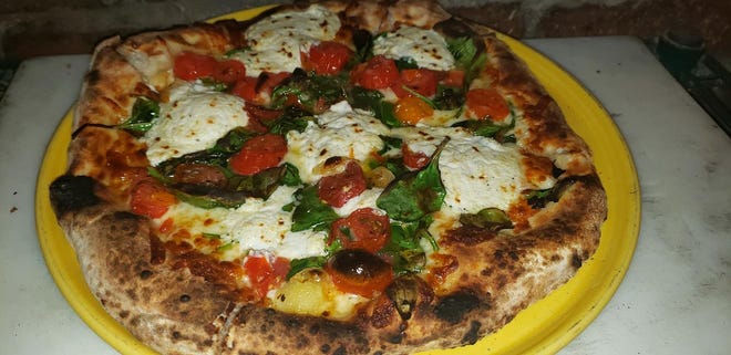 La pizza della Trattoria Ciao è cotta nel forno a legna.  (Foto: foto per gentile concessione di Trattoria Ciao)