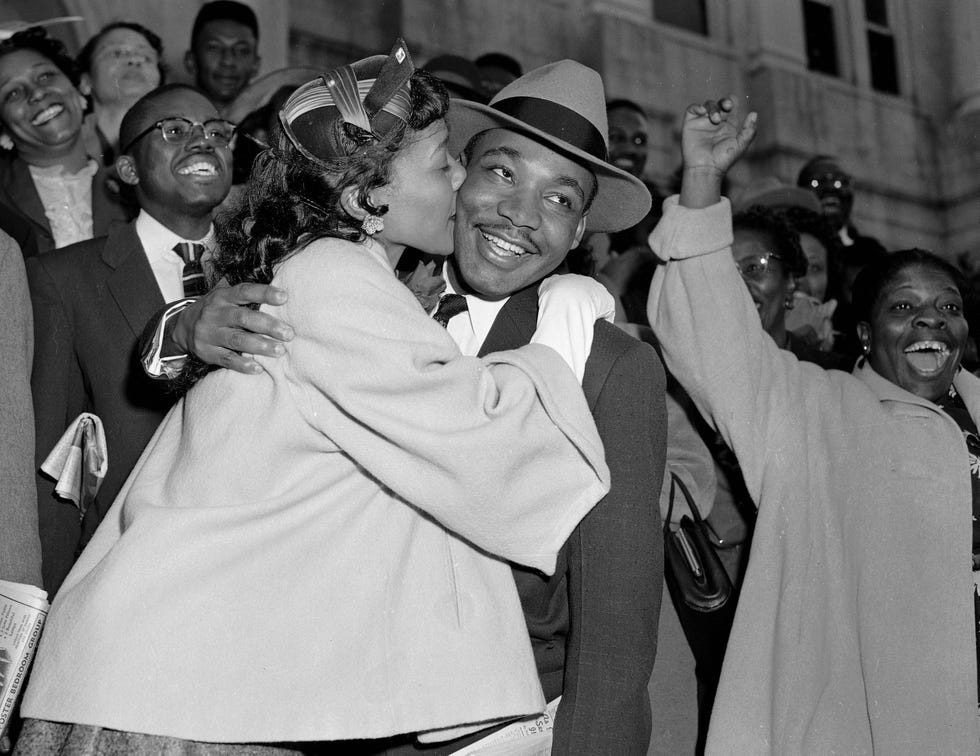 In this March 22, 1956, file photo, the Rev. Martin Luther King Jr. is welcomed with a kiss by his wife, Coretta, after leaving court in Montgomery, Ala. King was found guilty of conspiracy to boycott city buses in a campaign to desegregate the bus system, but a judge suspended his $500 fine pending appeal.